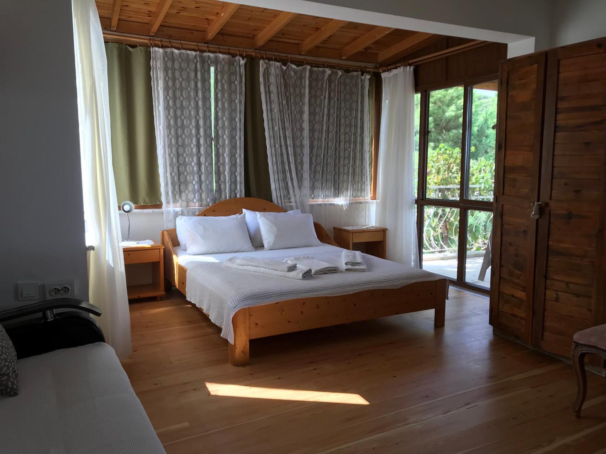 Gunebakan Taliani Hotel Айвалык Экстерьер фото