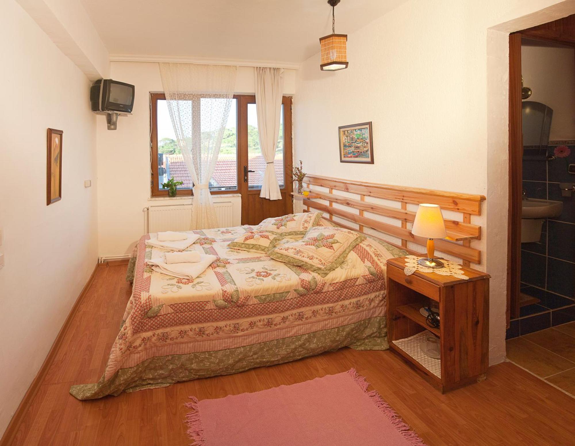 Gunebakan Taliani Hotel Айвалык Экстерьер фото